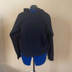 A Black six feet hoodie.